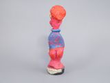 an image of a sculpture of a person with a hat on
