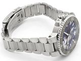 a watch that is sitting on a bracelet on a white surface