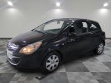 a picture of a black car parked in a garage