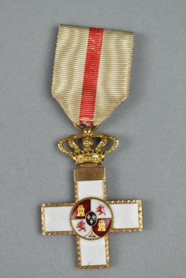une image représentant une croix surmontée d'une couronne