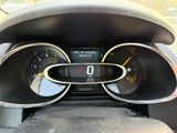 a close up of a car dashboard with a speedometer and gauges