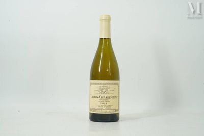 a bottle of wine that is sitting on a table