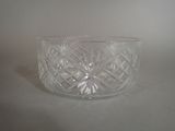 a glass bowl that is sitting on a table