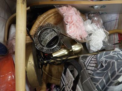 many items in a basket on the shelf