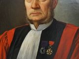 portrait of a man in a red and black robe sitting in a chair