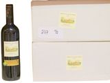 a bottle of wine next to a box of wine