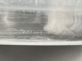 a close up of a plastic container with a cat inside of it