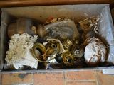 a box full of assorted items sitting on the floor