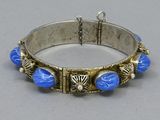 silver bracelet with blue glass beads and silver clasp