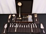 a case with silverware in it on a table