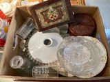 a box with a lot of glass items inside of it