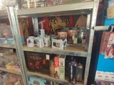 a shelf with many different items in it in a store