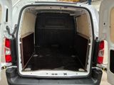 a white van with the back door open and the back door open