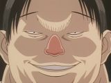 a close up of a man with a red nose