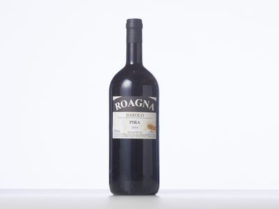 a bottle of wine that is sitting on a table