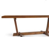 une table en bois avec deux pieds et un plateau en bois