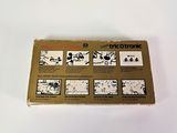 a close up of a box with instructions on it on a white surface