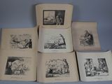 plusieurs vieux livres sur une table, avec des photos de personnes dessus