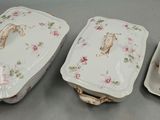 three dishes and a tray on the table