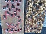 pair of antique carved wood bookends with gold leaf designs