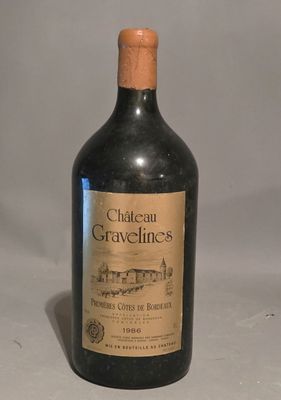 a bottle of wine that is sitting on a table