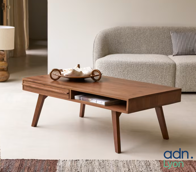 a coffee table with a drawer on it in a living room