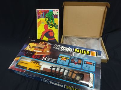 a box that has a train in it and a box with a picture on it