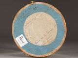 a picture of a blue and white plate with writing on it