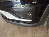 a close up of the front bumper of a car