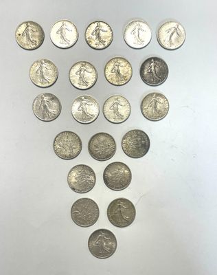a close up of a bunch of coins on a table