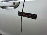 a sticker on the door of a car that says vauto