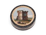 an image of a small round box with a painting of a castle on it