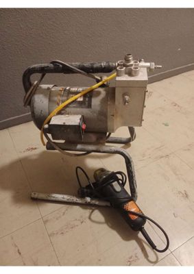 a machine that is sitting on the floor next to the wall