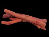 two sticks of carrots tied together on a black background
