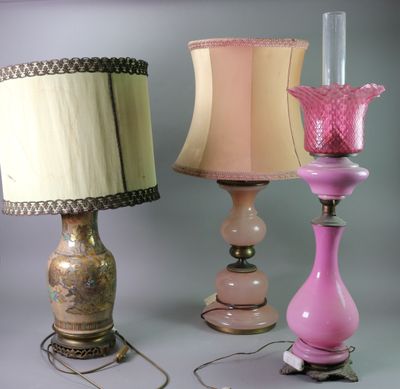 three lamps that are next to each other on a table