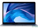 un ordinateur portable MacBook Air d'Apple avec un écran bleu