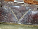 a close up of a brown bag with a dog ' s face on it