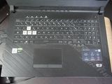 a laptop computer sitting on top of a desk