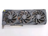 the graphics card has two fans on top of it, and a fan on the bottom of the card