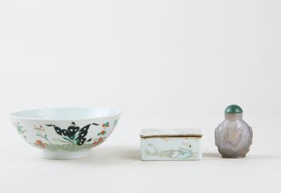 a small bowl and a small bowl sitting next to each other