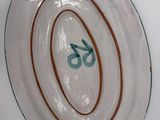 a plate with a number on it on a table