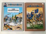 two books on a white table with a picture of a man on a horse and a man on a horse on a horse