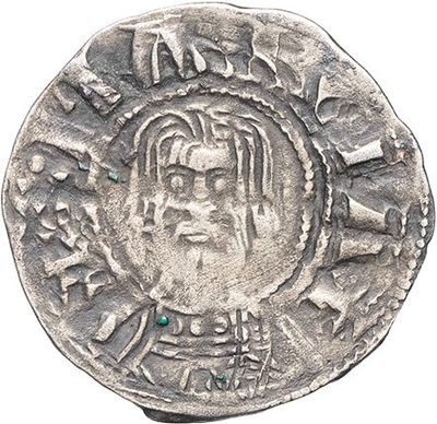 a silver coin with an image of a man on it