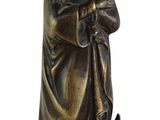 an image of a statue of a woman holding a cat