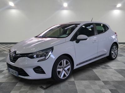 the white car is parked on a checkered tile floor