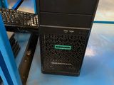 a desktop computer sitting on top of a blue table
