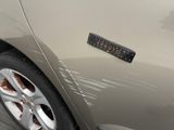 a close up of a car with a sticker on the side of it
