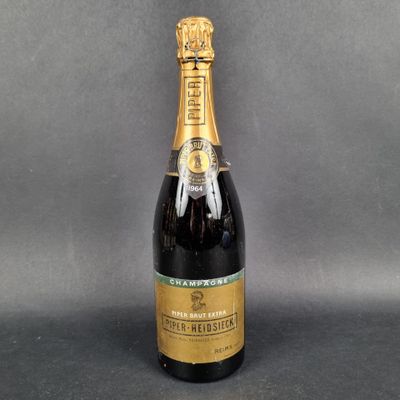 a close up of a bottle of champagne on a table