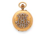 an image of a gold pocket watch with a monogram on the front