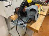 a machine that is sitting on top of a wooden table